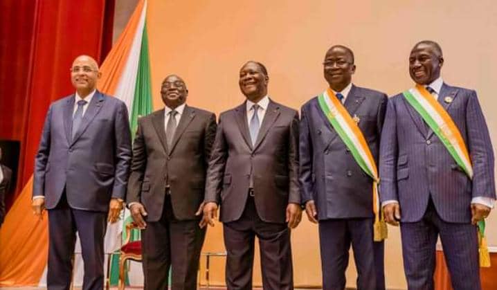 Le Vice Président Tiémoko Meyliet Koné et le premier ministre Patrick Achi posant le président de la République et ceux du parlement